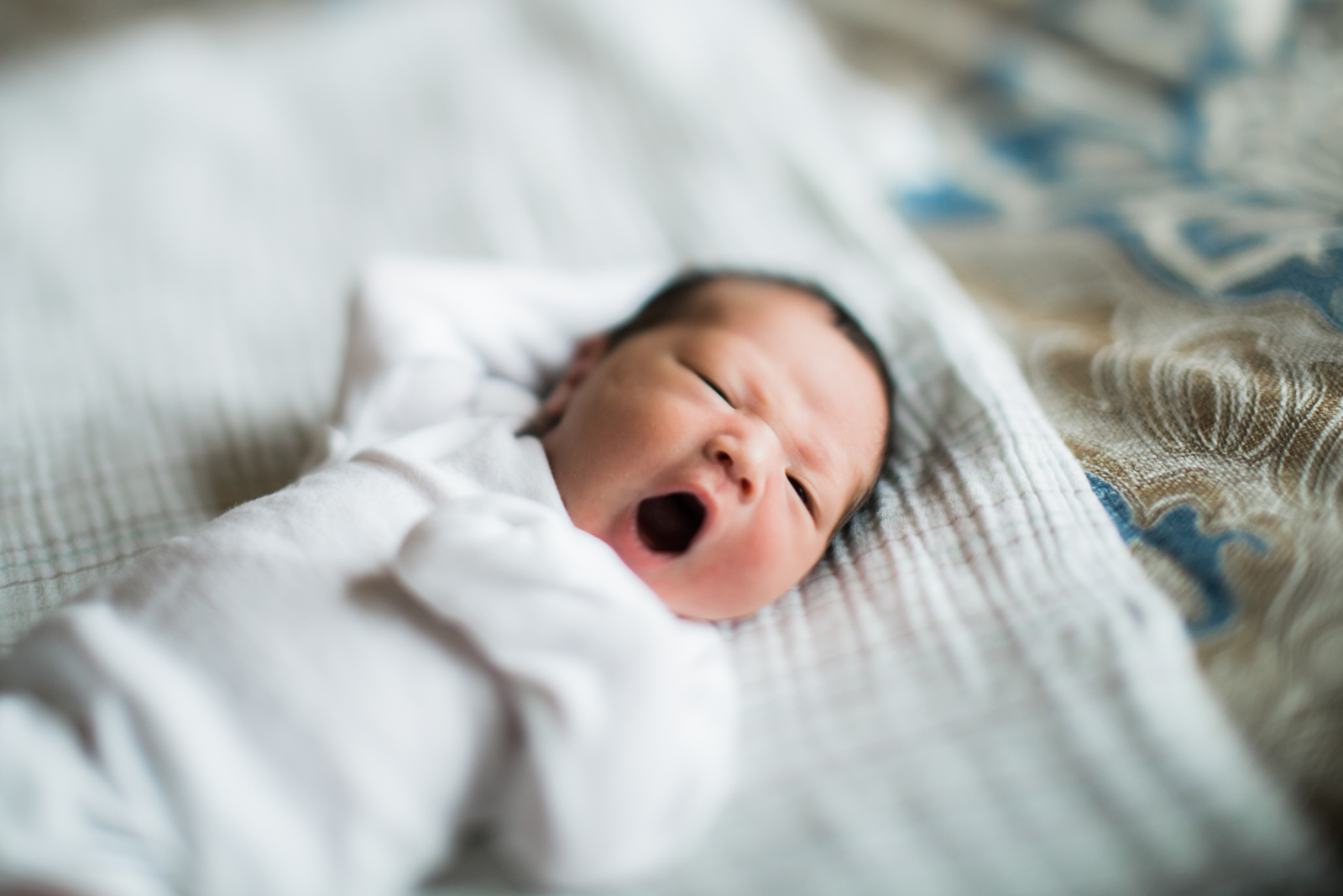 Newborn Pricing Slider-8 Infant Yawn Freelensed Photograph